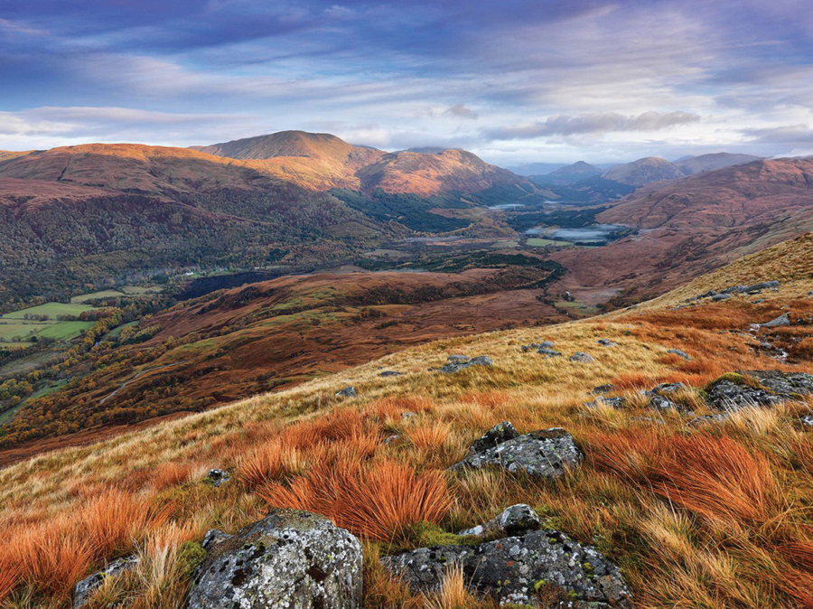 Rolling Hills of red, brown and green of the Loch Lomond National Park